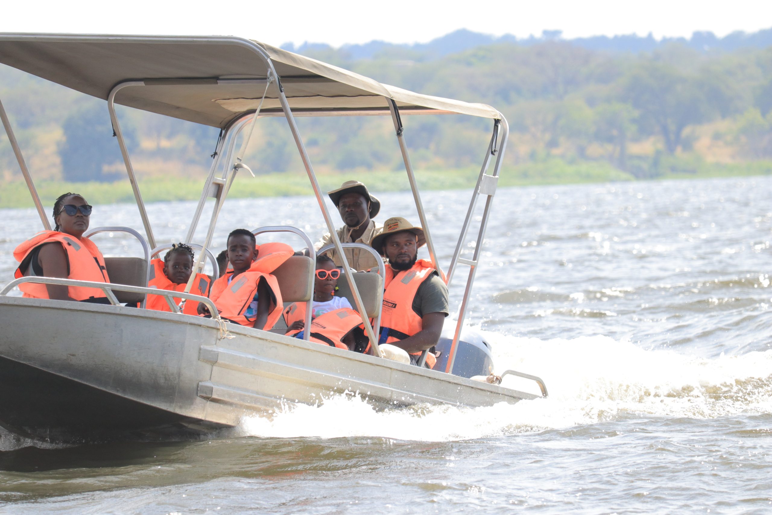 Family boat cruise on the Nile in Uganda